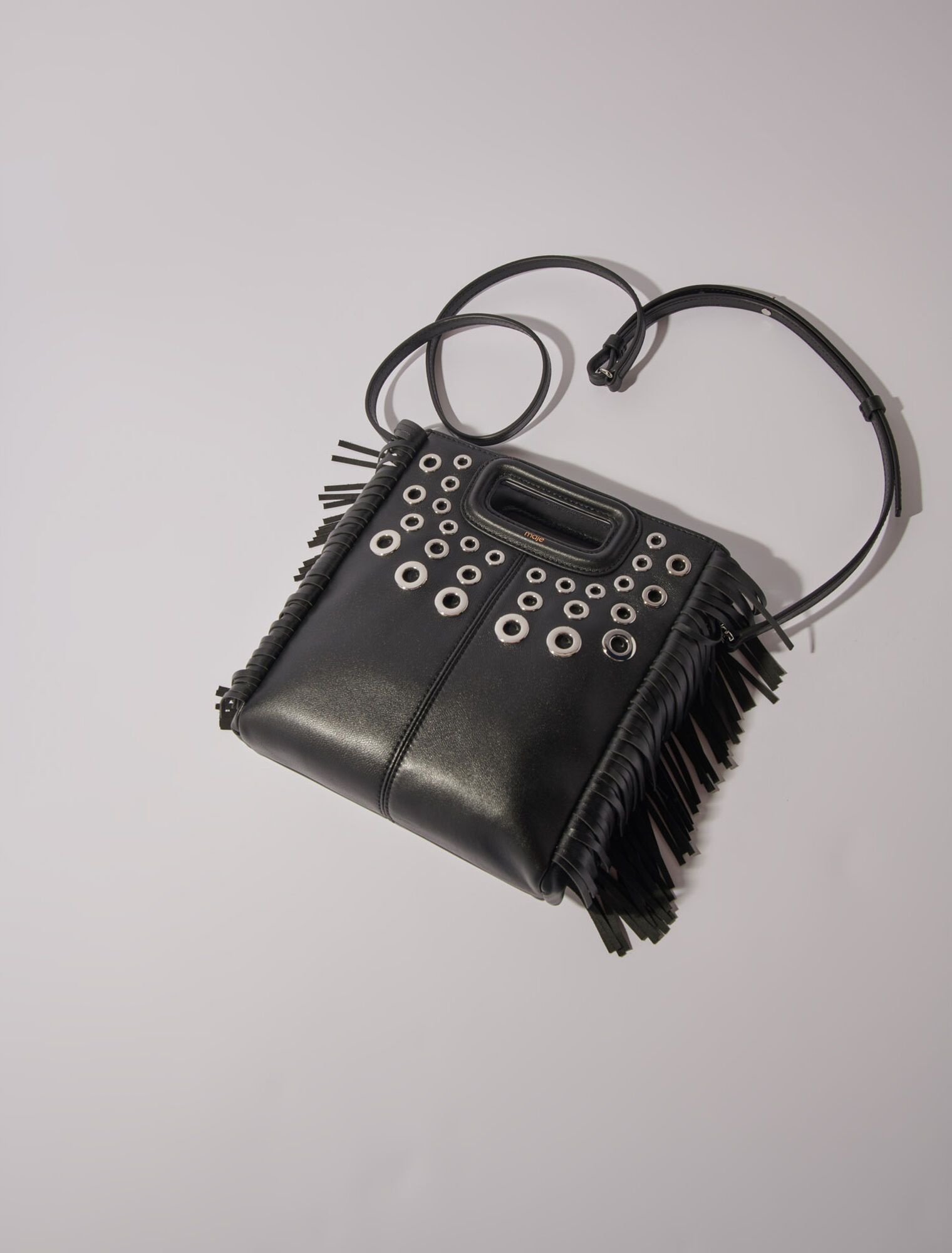 Sac M en cuir à œillets