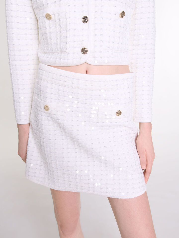 Jupe courte en maille à sequins
