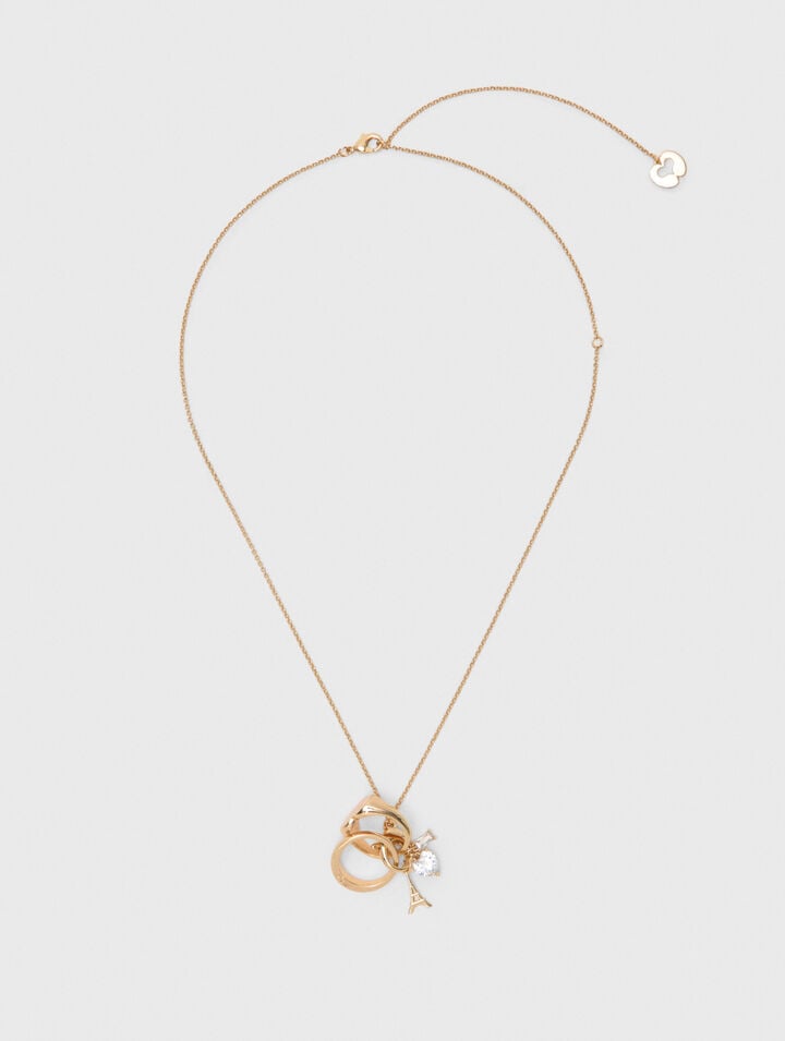 Collier dor&eacute; avec d&eacute;tails bagues