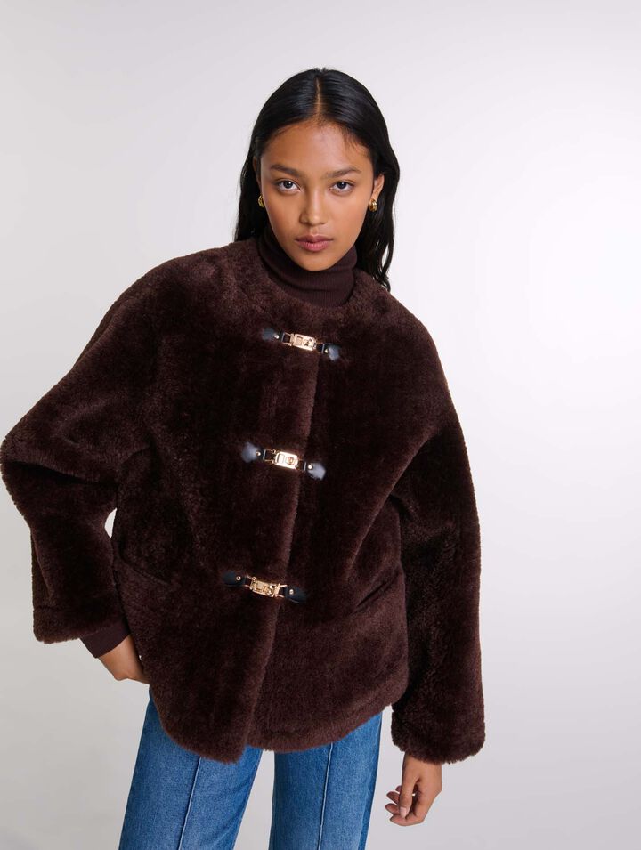 Manteau court en fausse fourrure
