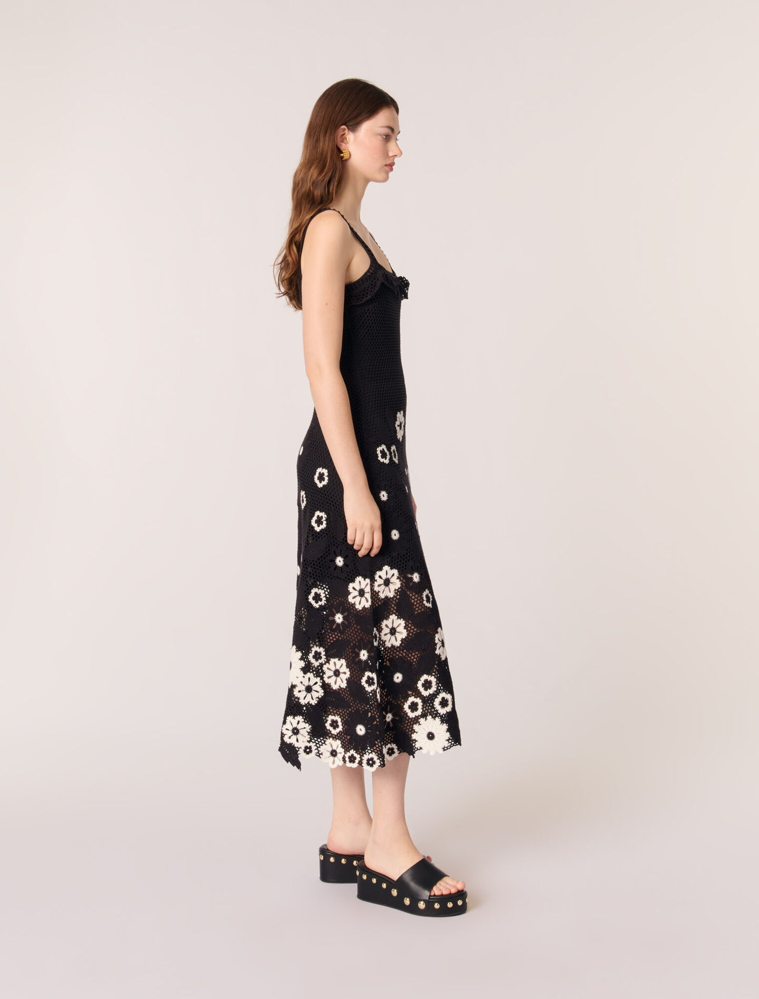Mules compensées en cuir à studs