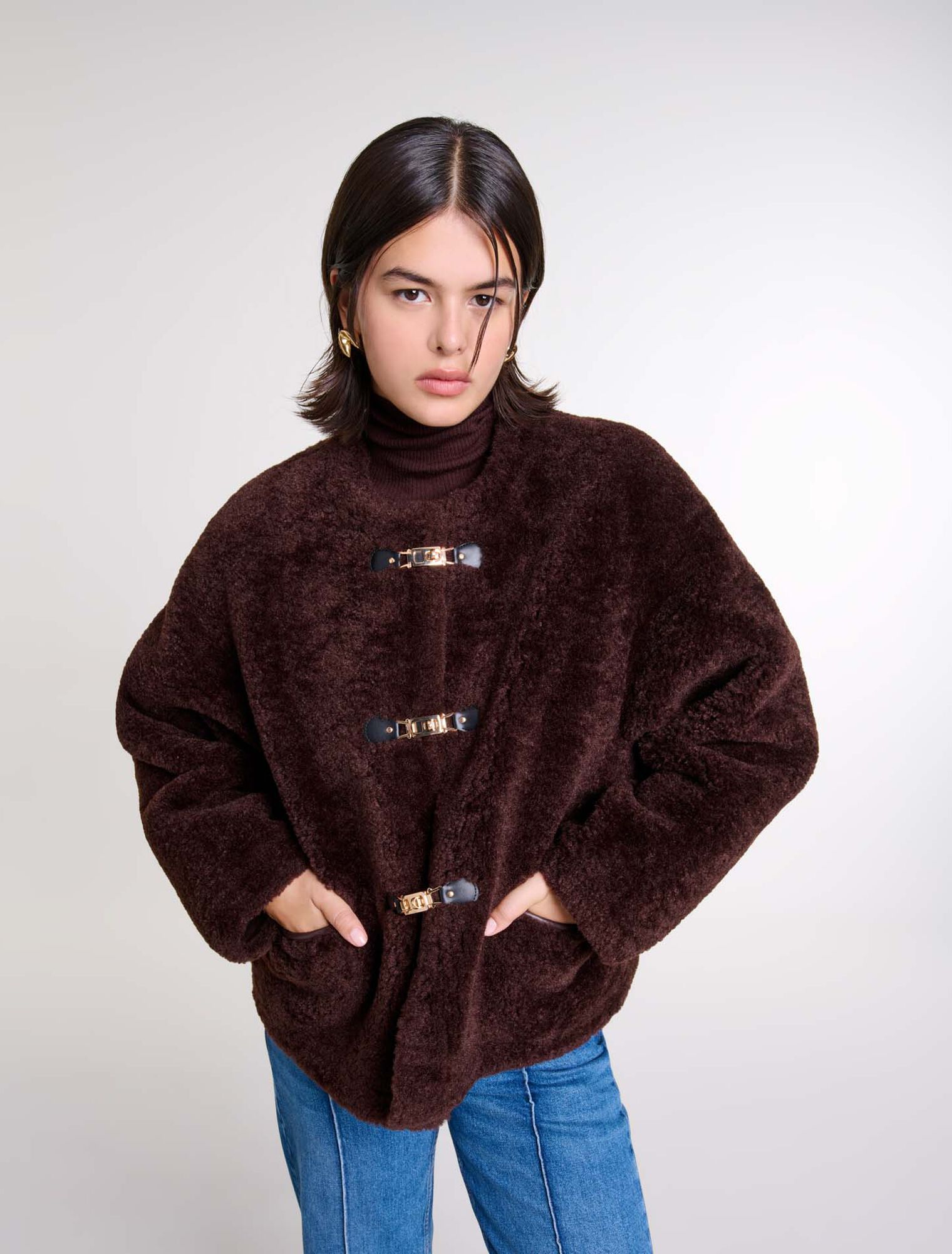 Manteau court en fausse fourrure
