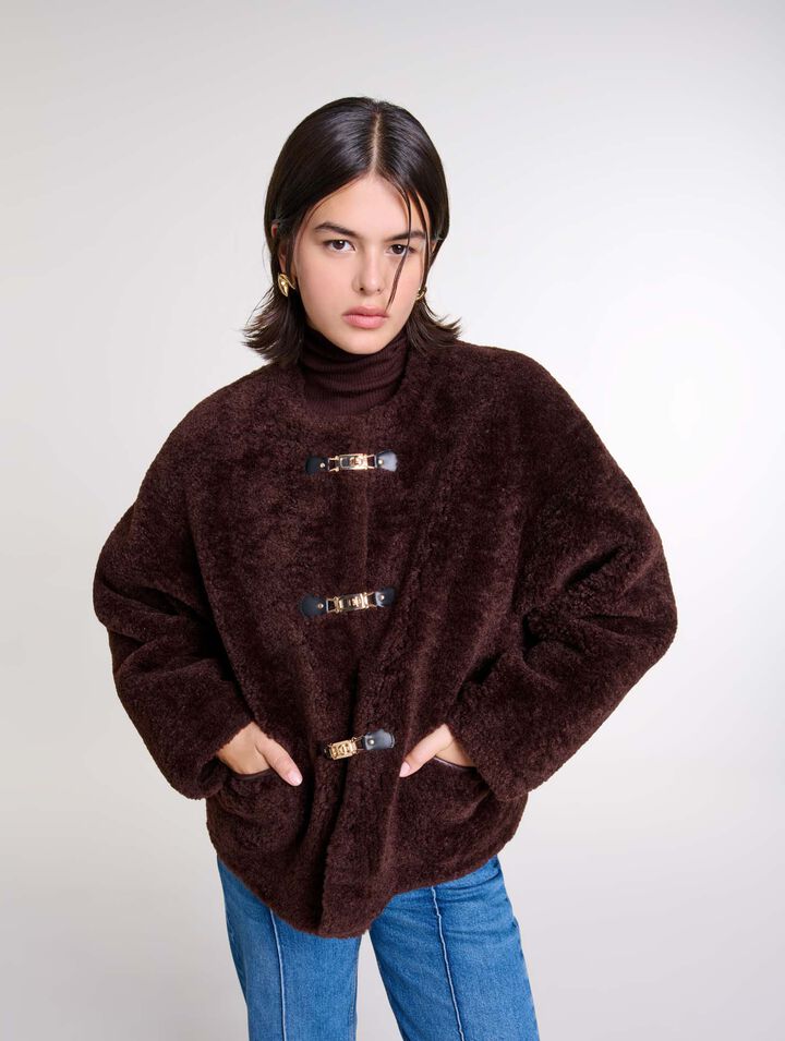 Manteau court en fausse fourrure