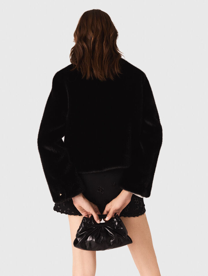 Manteau court en fausse fourrure