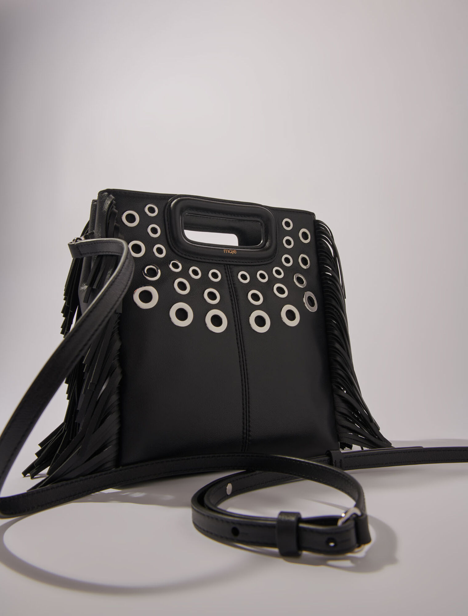 Sac M en cuir à œillets