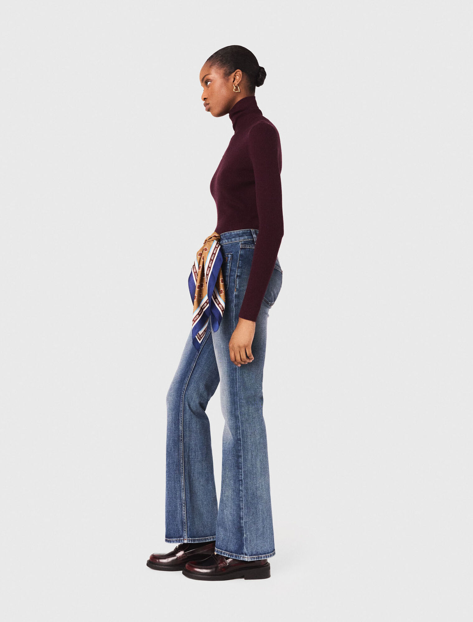 Jean bootcut à poches zippées