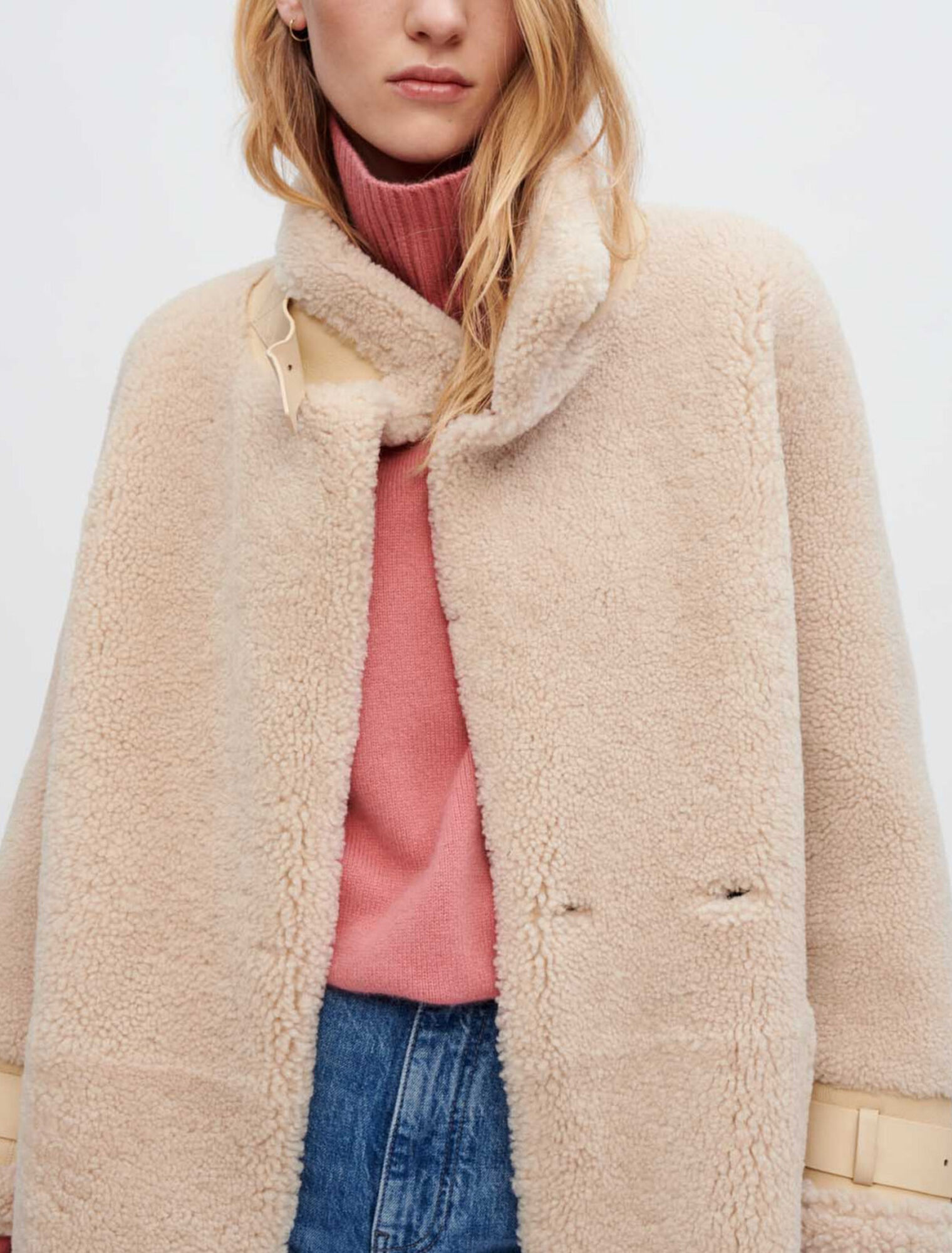 Manteau en peau lainée et cuir