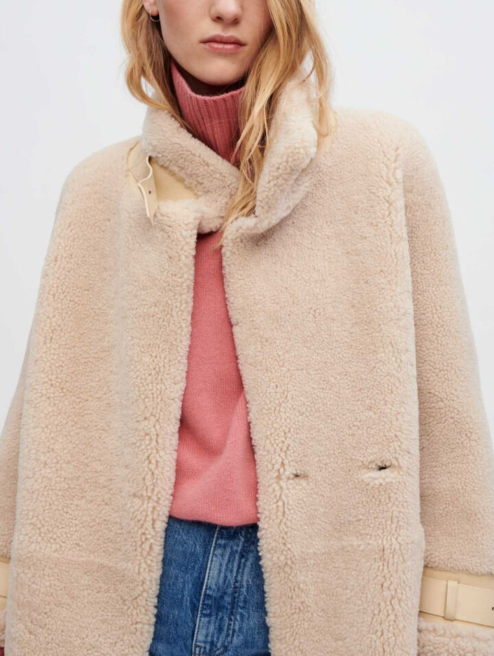 Manteau en peau lainée et cuir
