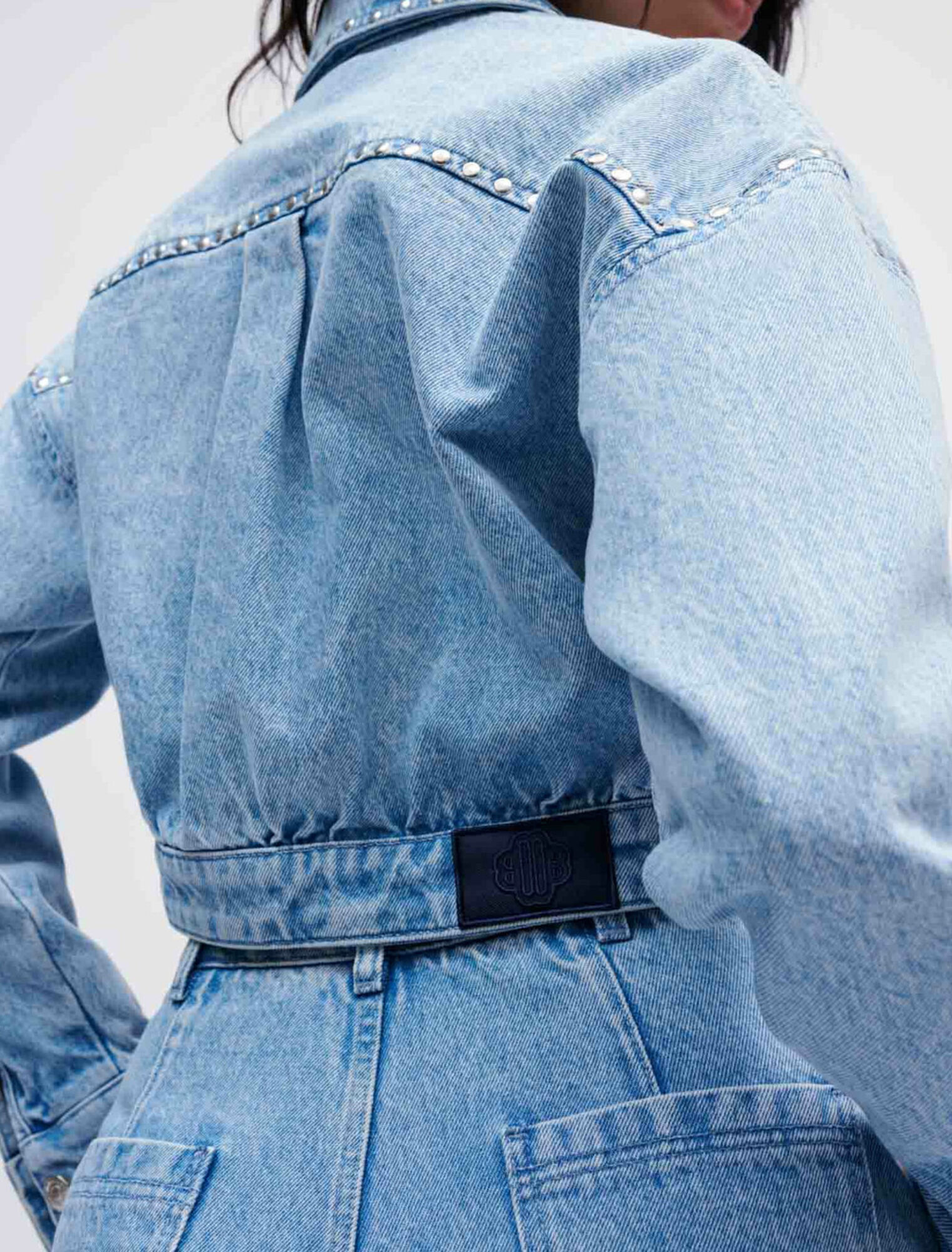 Blouson en jean à studs