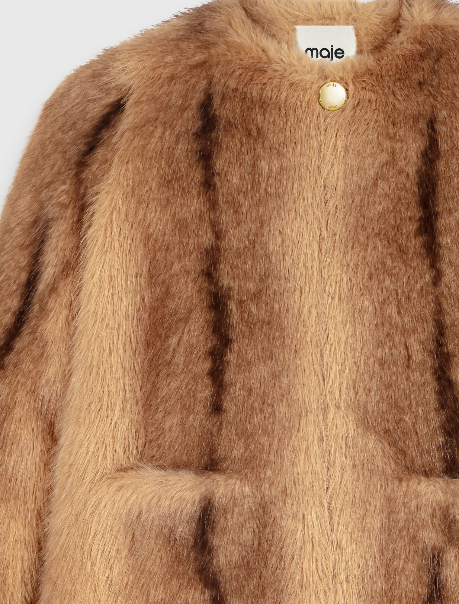Manteau mi-long en fausse fourrure