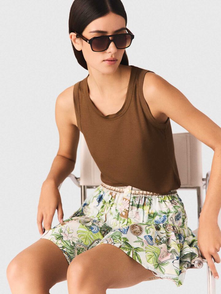 D&eacute;bardeur en maille c&ocirc;tel&eacute;e