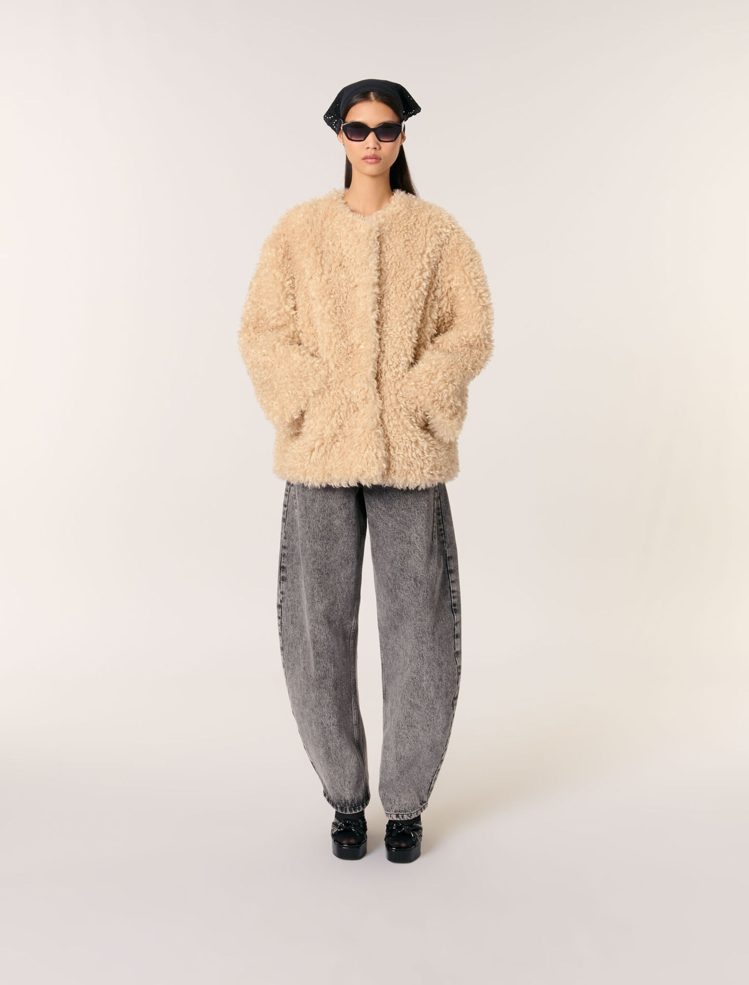 Manteau court en fausse fourrure