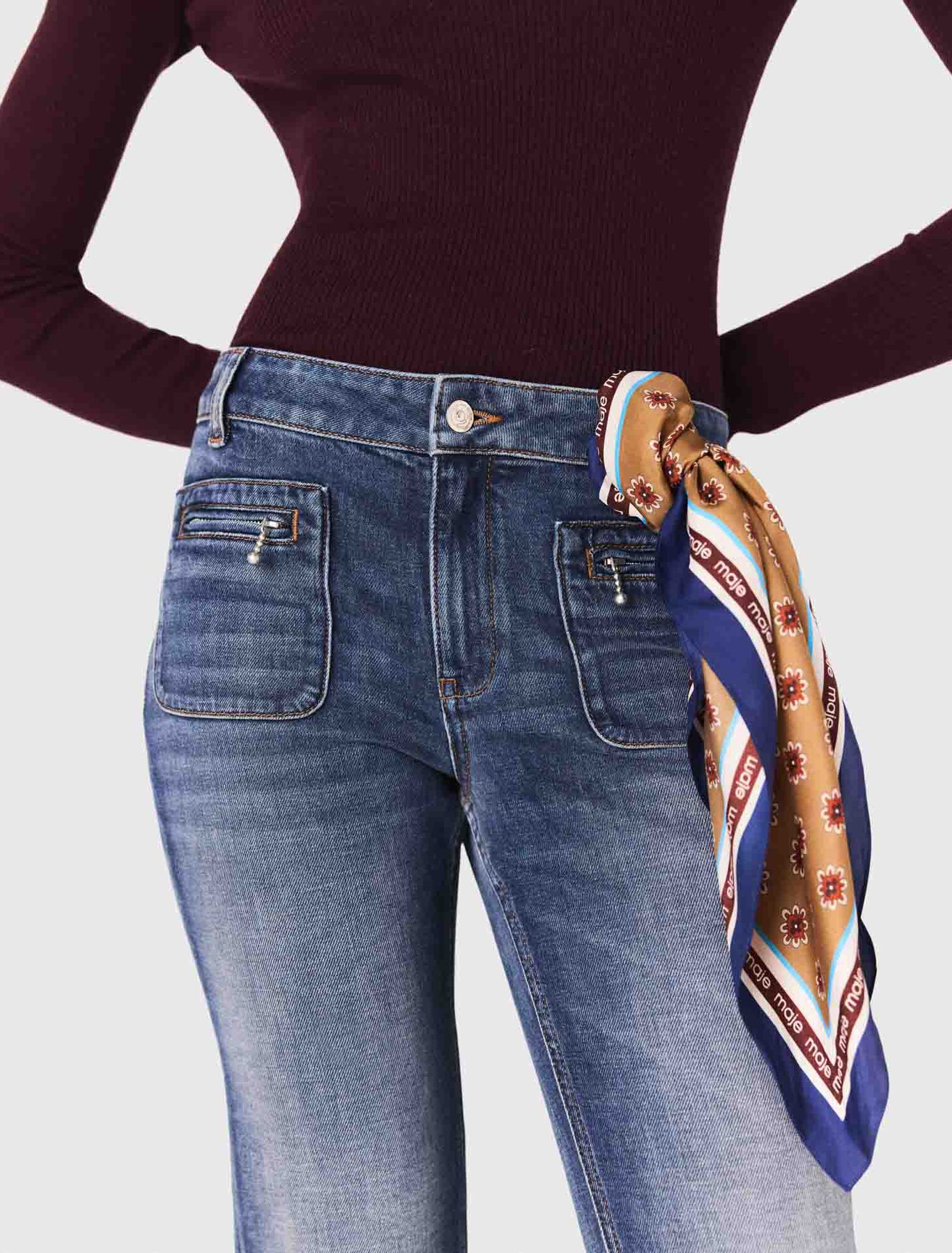 Jean bootcut à poches zippées