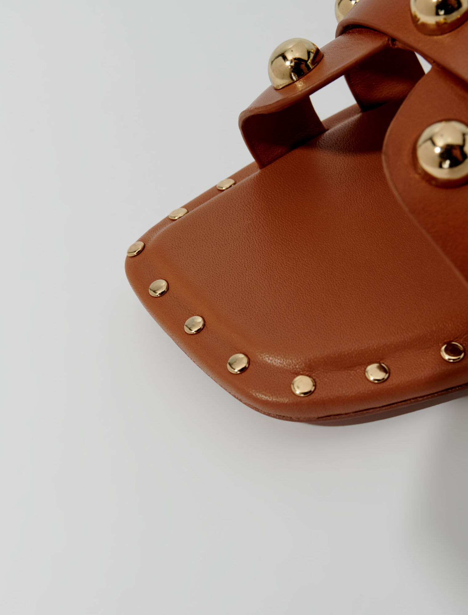 Mules en cuir ornées de studs