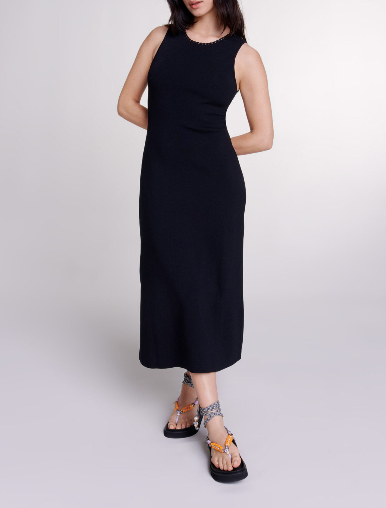 Robe longue en maille à découpes