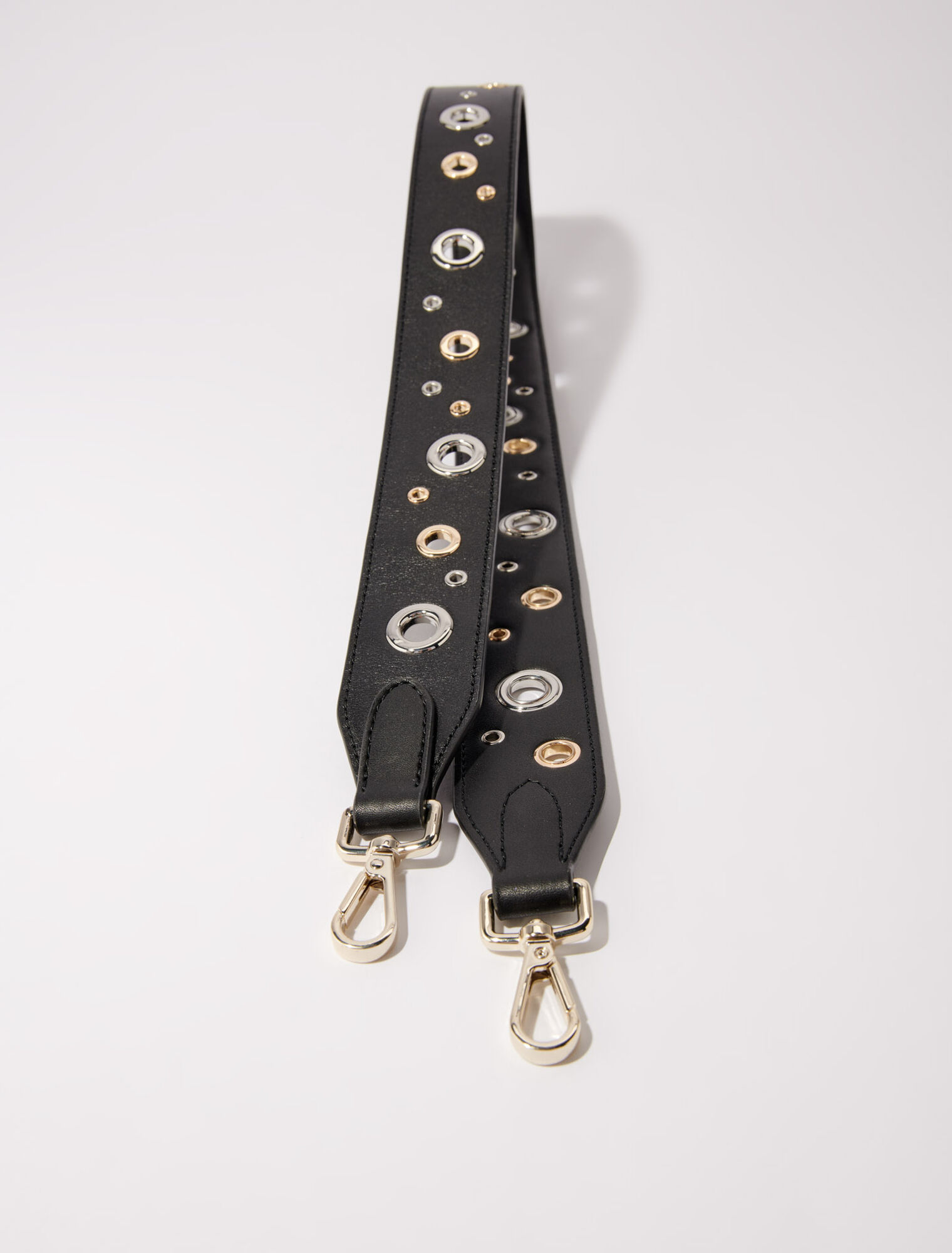 Bandoulière en cuir et œillets