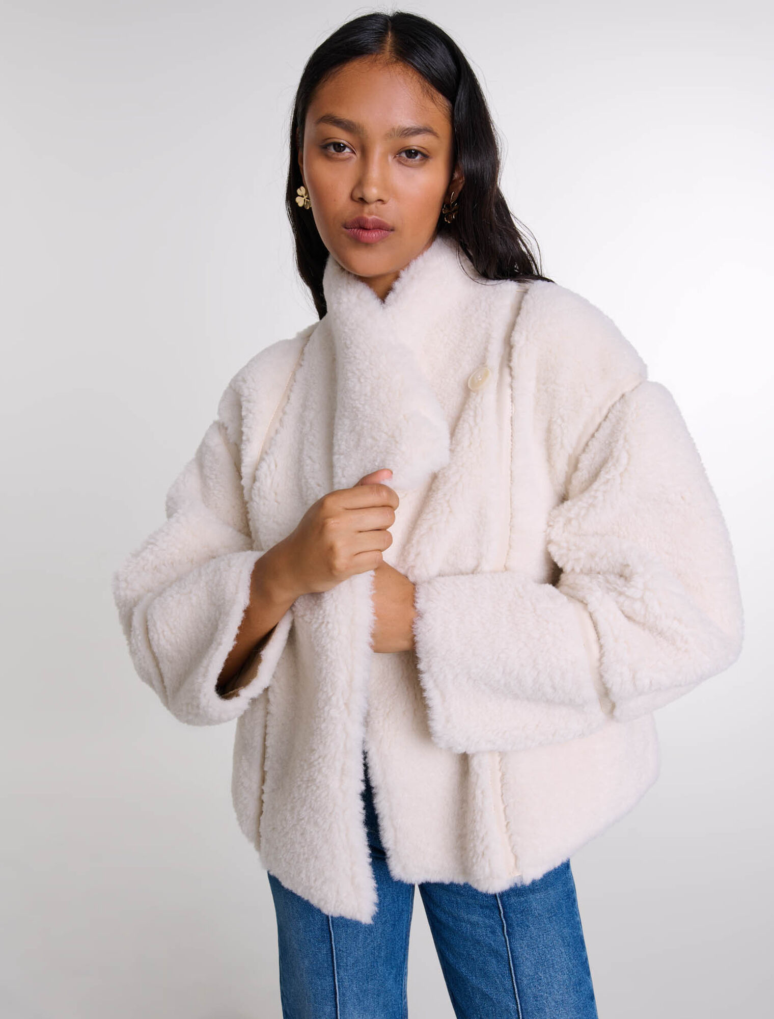 Manteau court en fausse fourrure