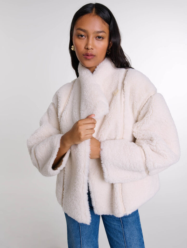 Manteau court en fausse fourrure