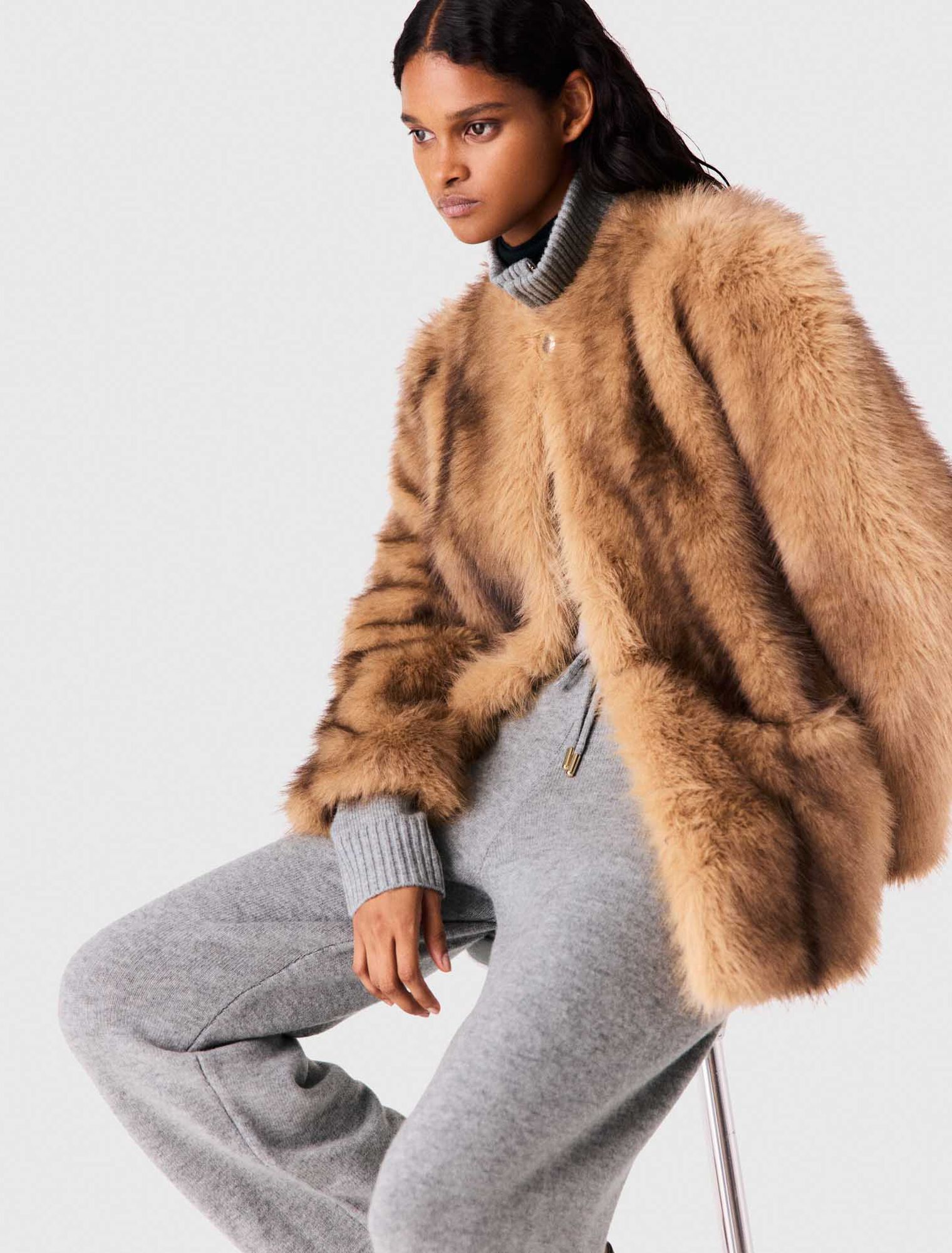 Manteau mi-long en fausse fourrure