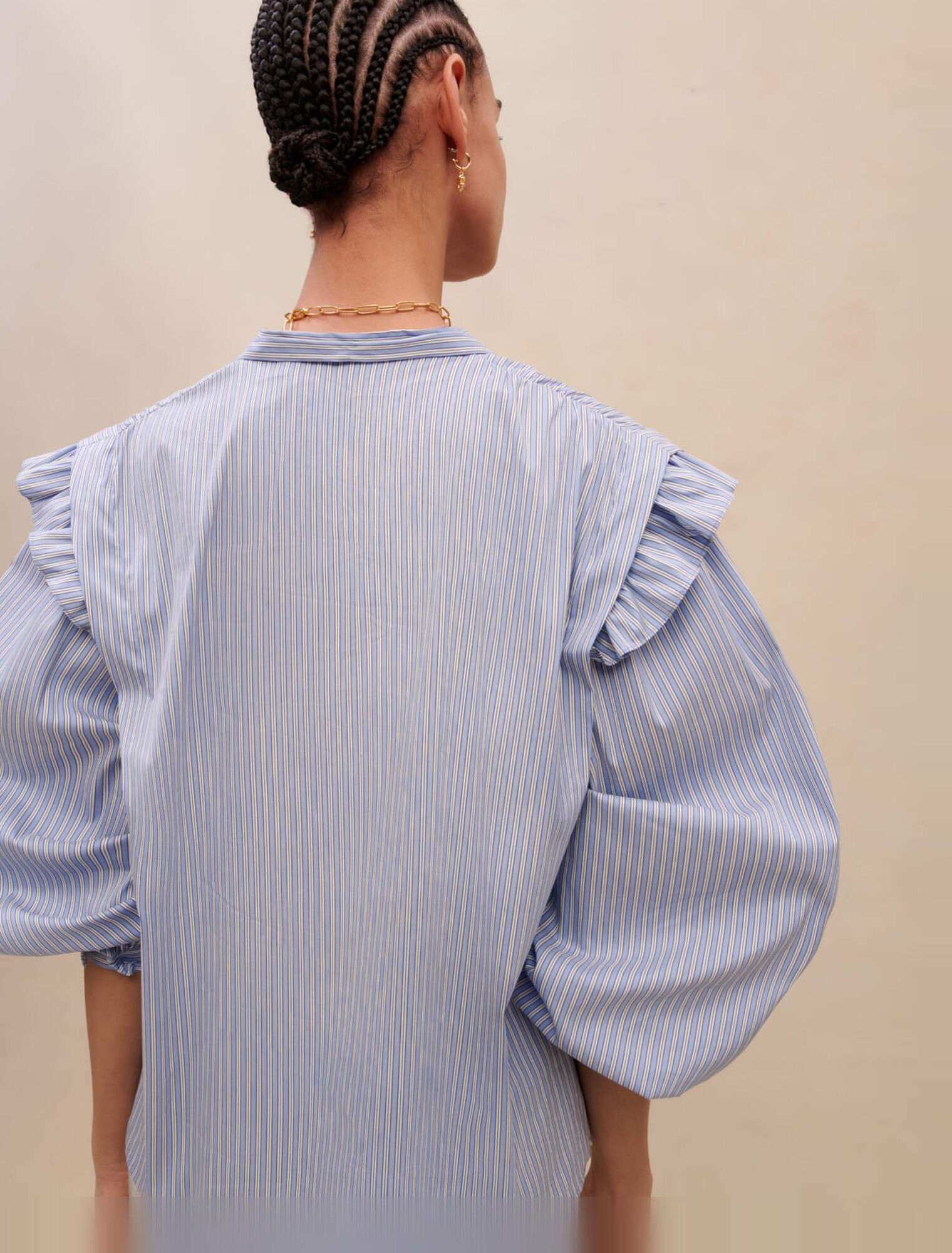 Blouse bleue à rayures