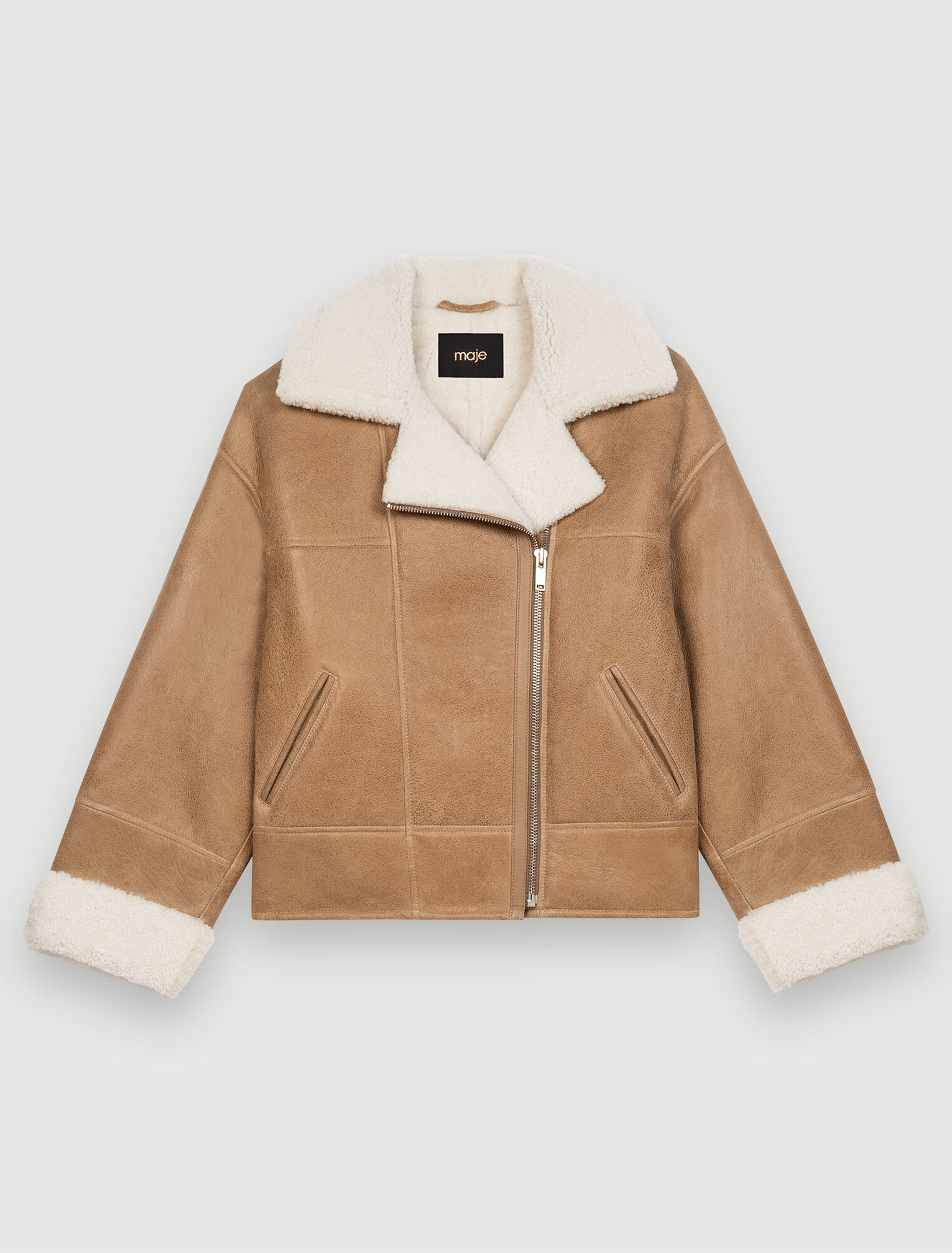 Manteau en peau lainée bicolore