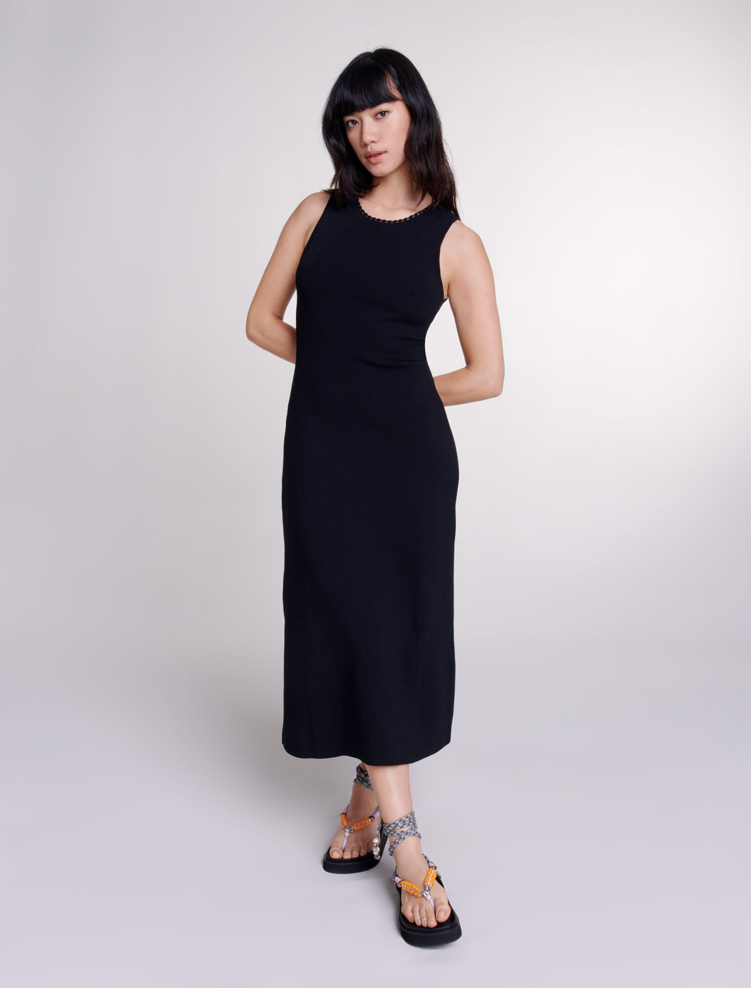 Robe longue en maille à découpes