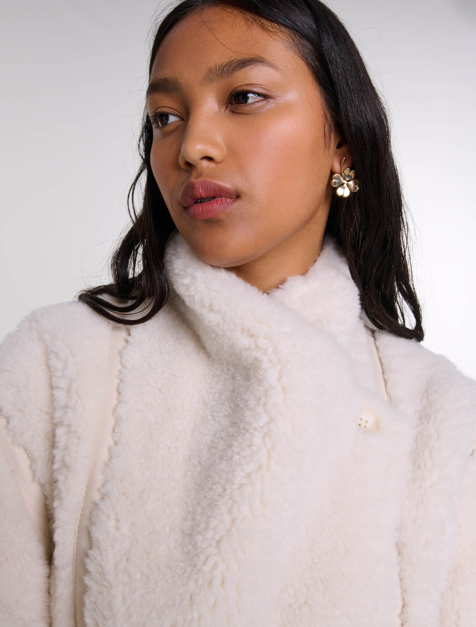 Manteau court en fausse fourrure