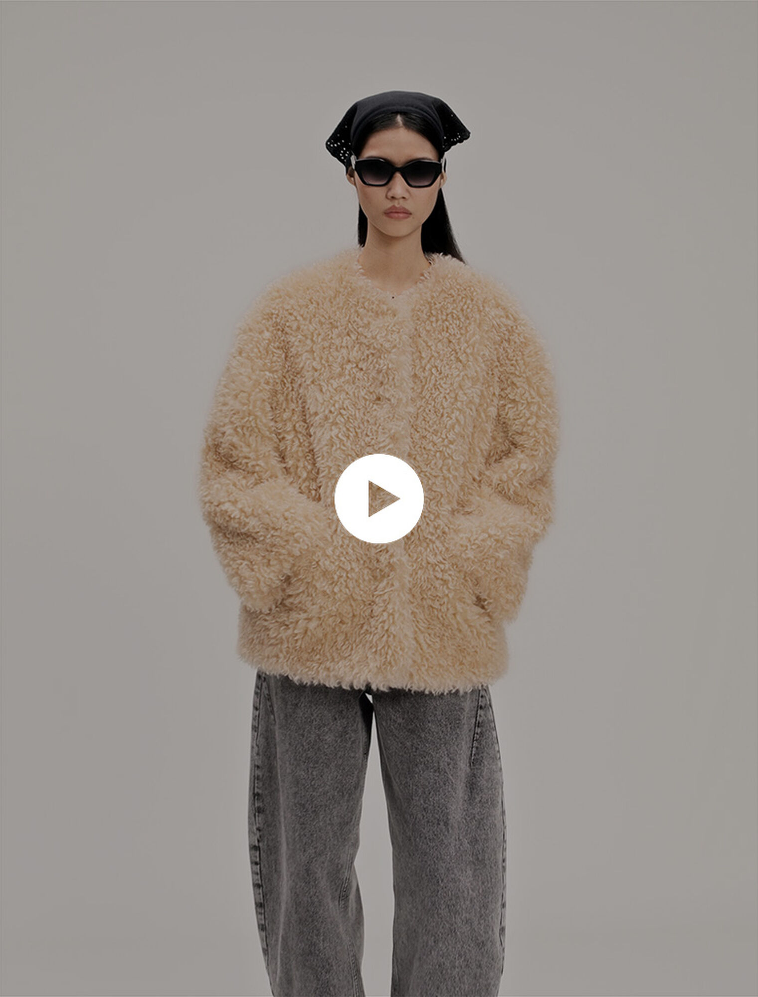 Manteau court en fausse fourrure