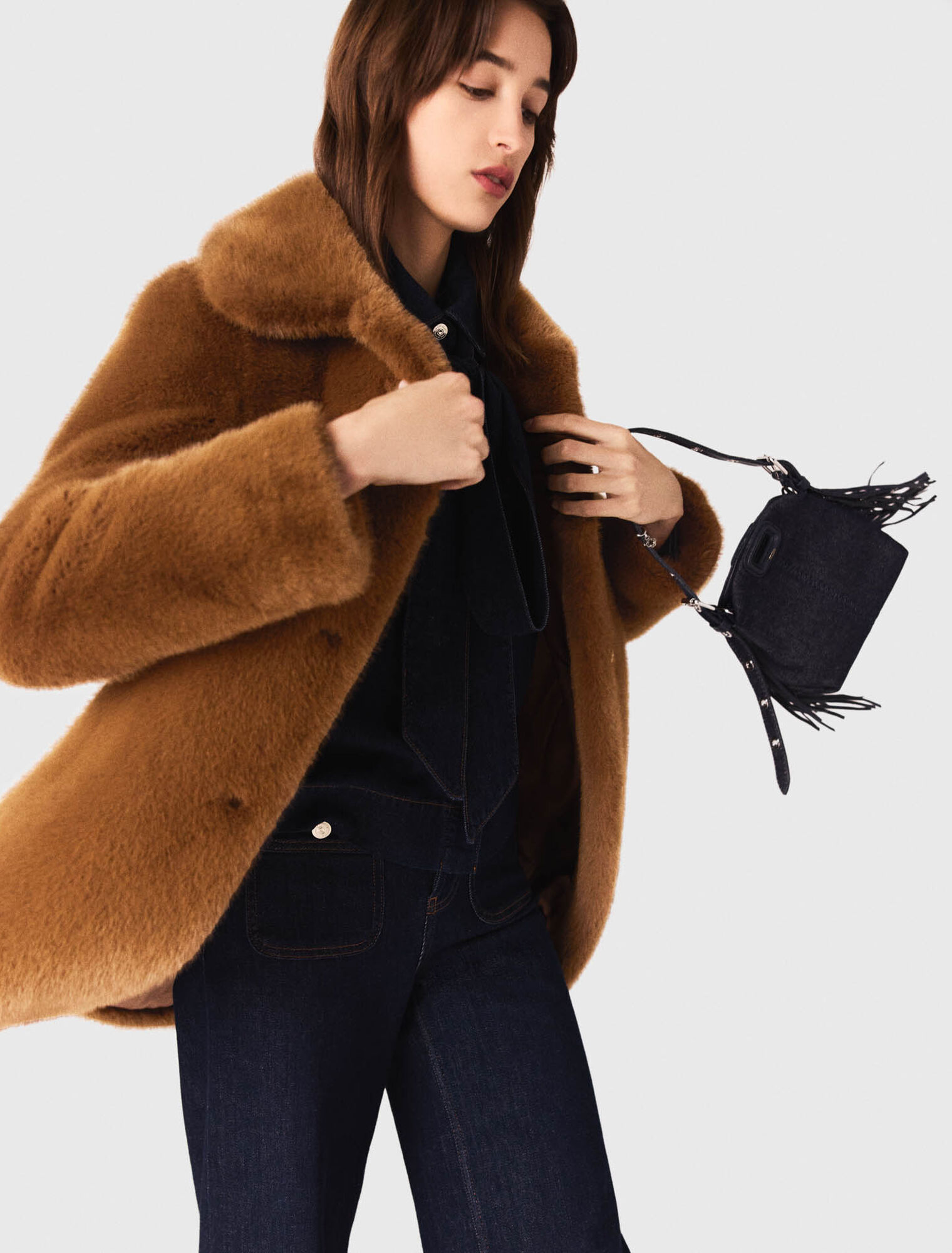 Manteau mi-long en fausse fourrure