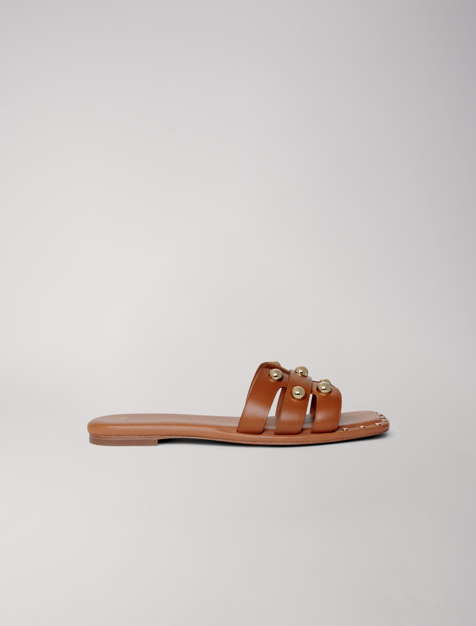 Mules en cuir ornées de studs