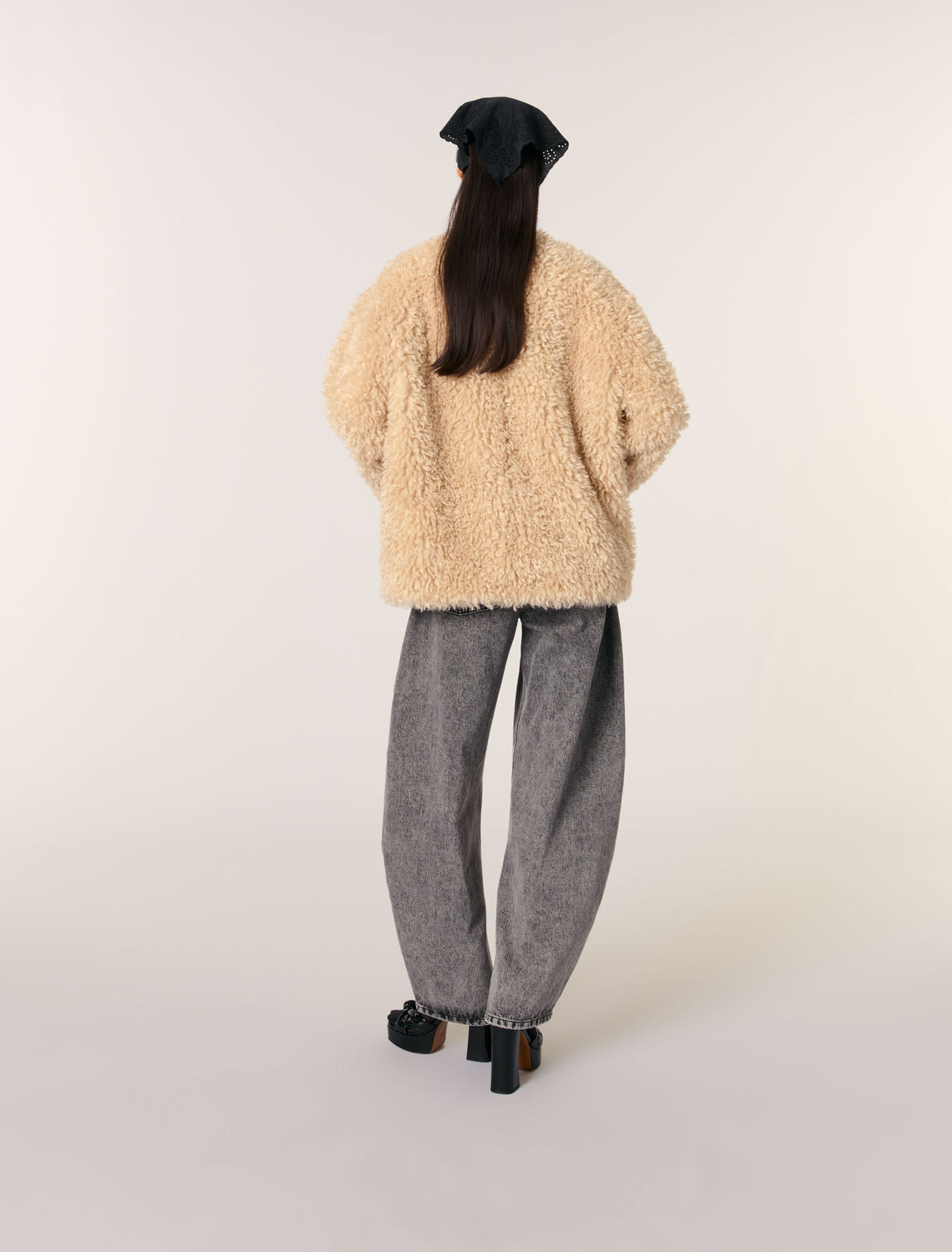 Manteau court en fausse fourrure