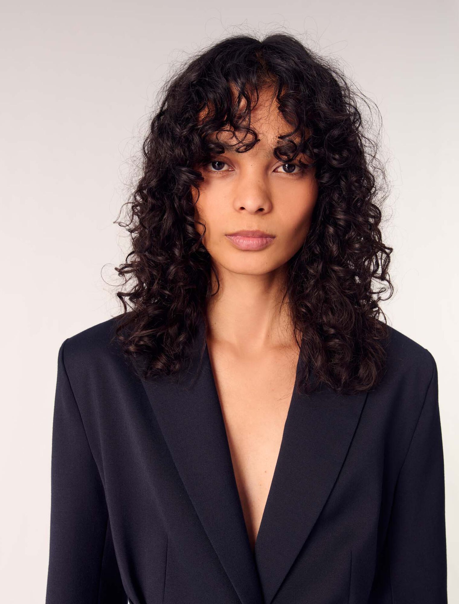 Veste tailleur avec dos plissé