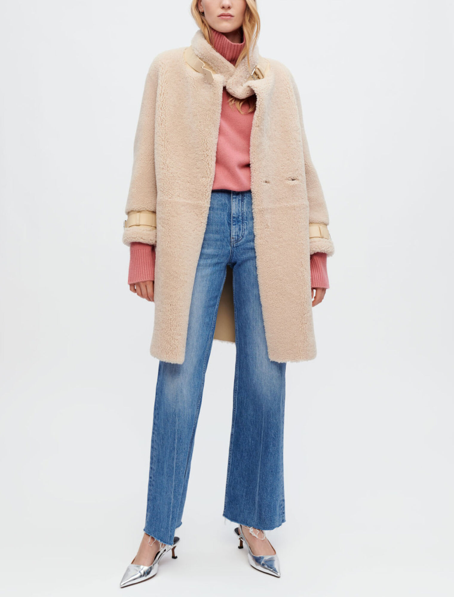 Manteau en peau lainée et cuir