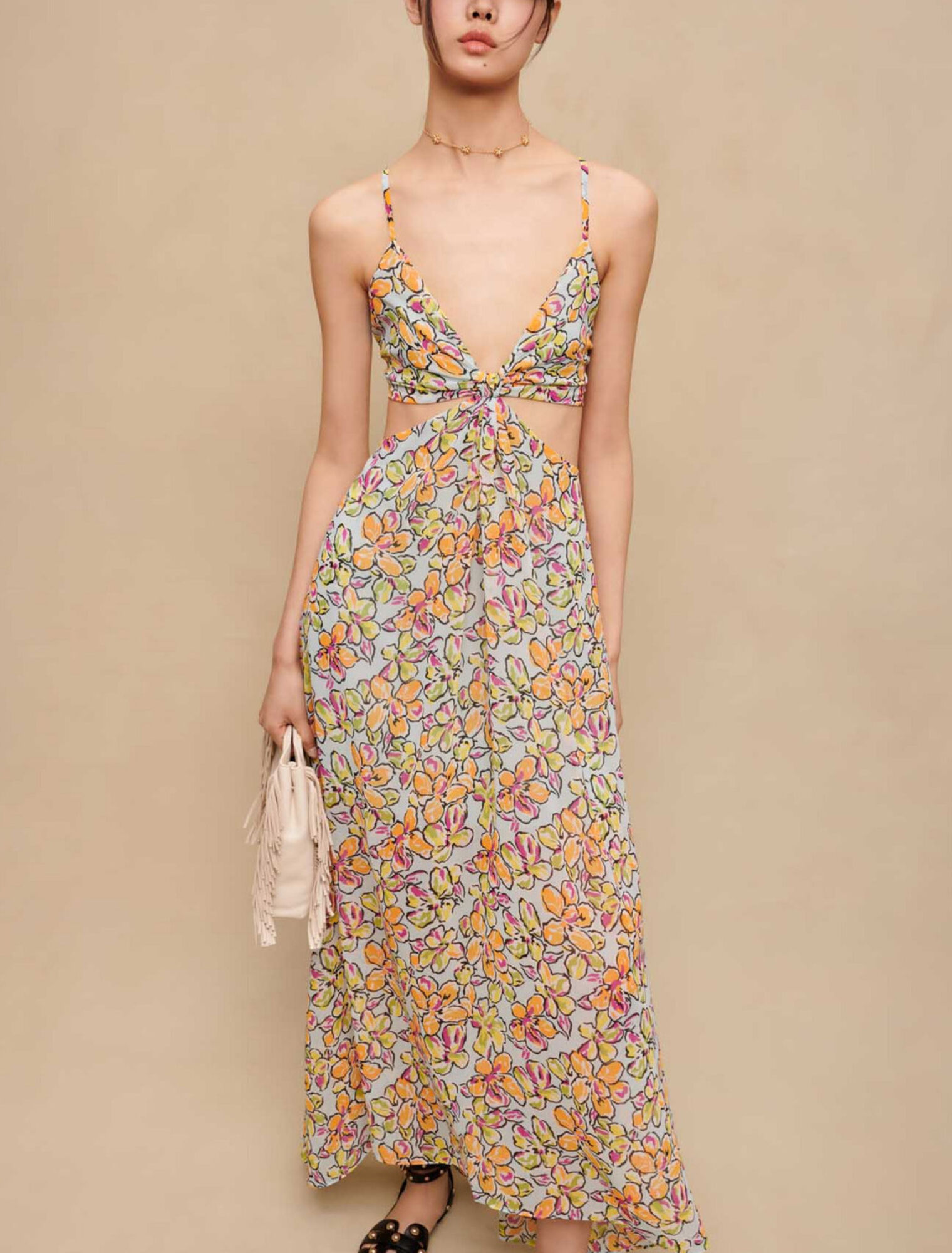 Robe longue fleurie à découpes