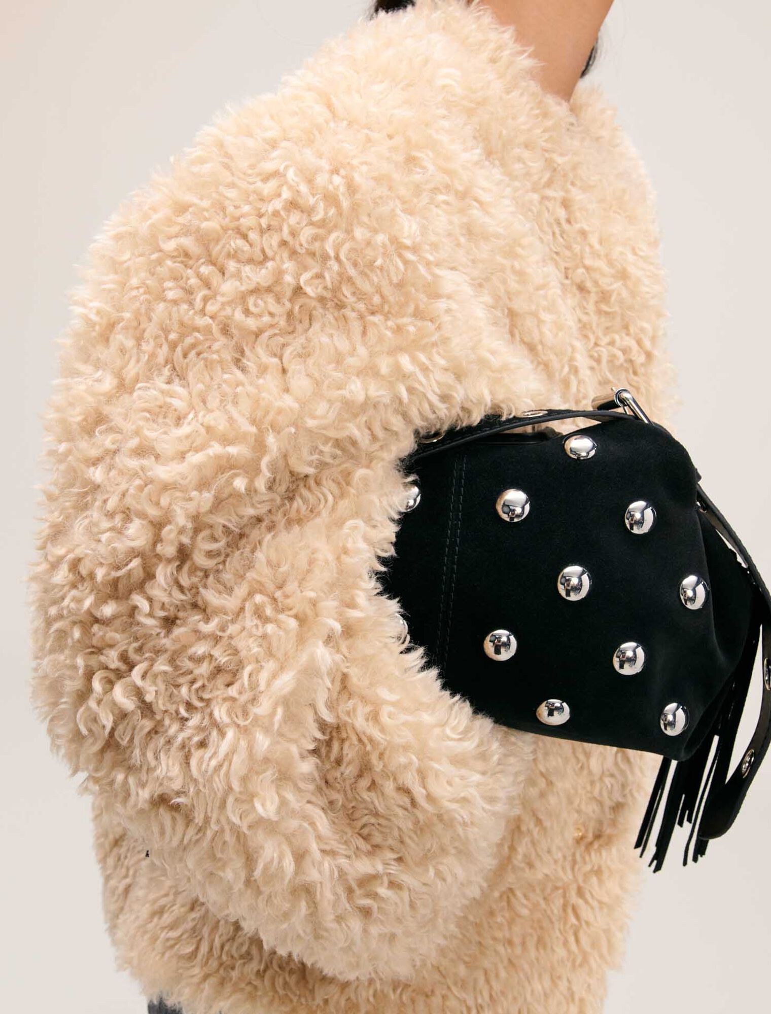 Manteau court en fausse fourrure