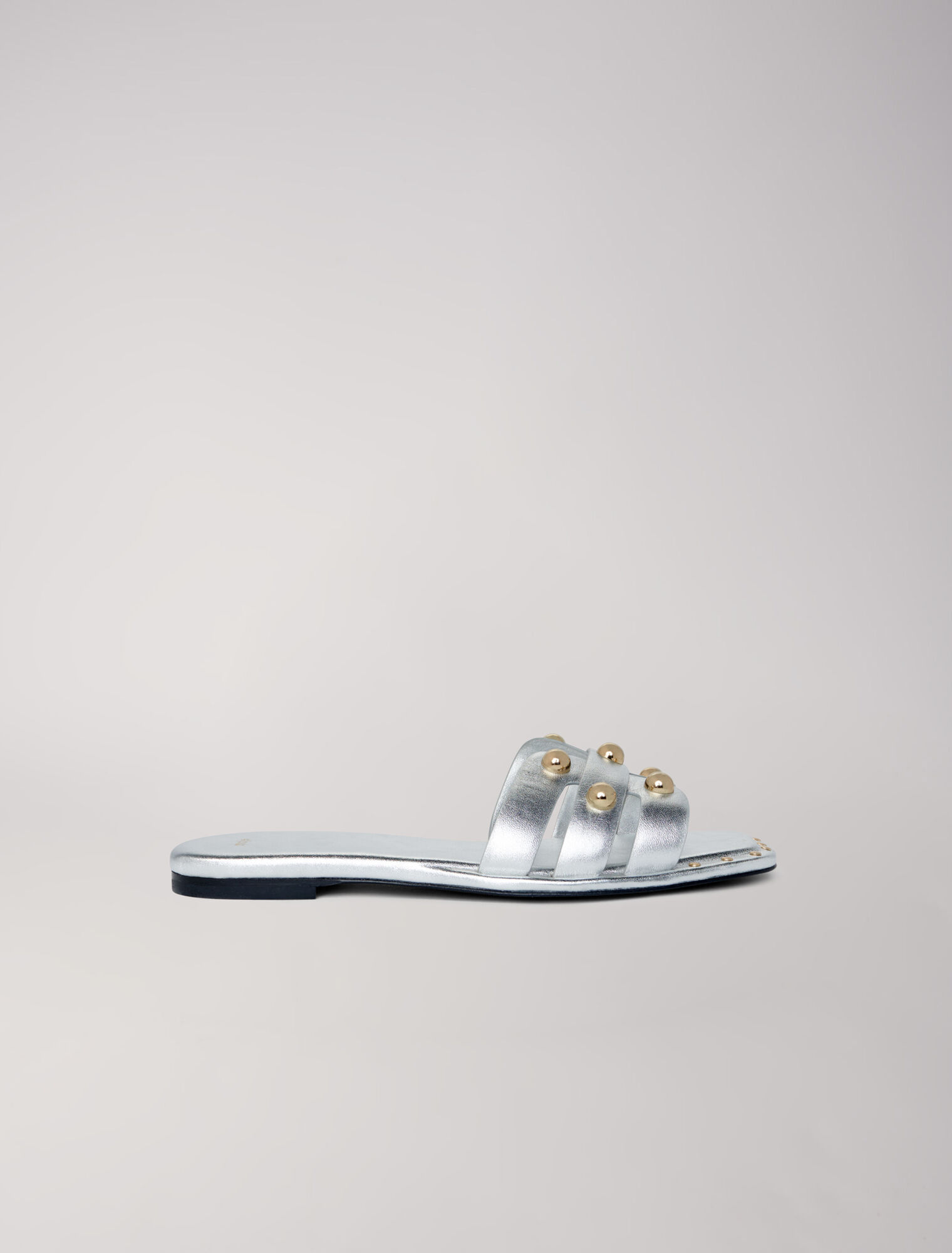 Mules en cuir ornées de studs