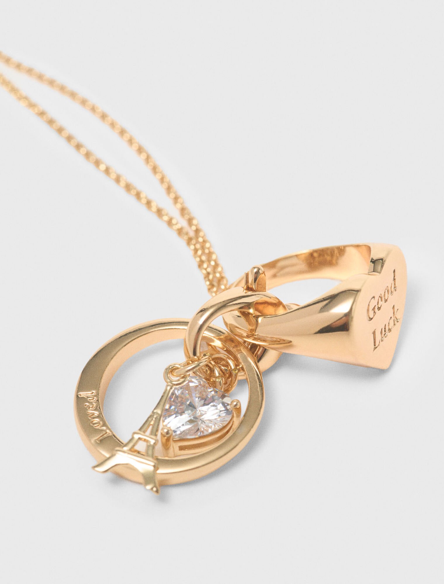 Collier dor&eacute; avec d&eacute;tails bagues