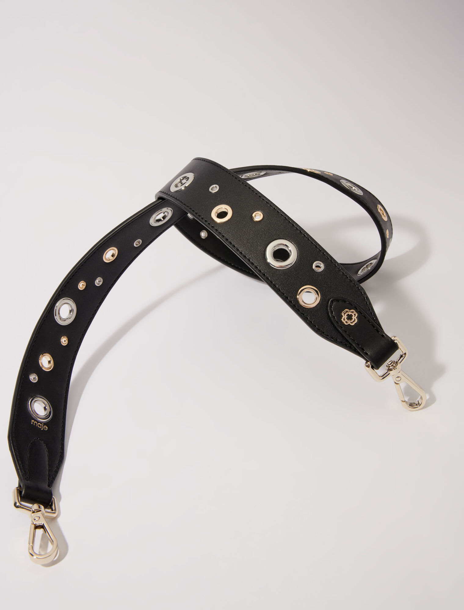 Bandoulière en cuir et œillets