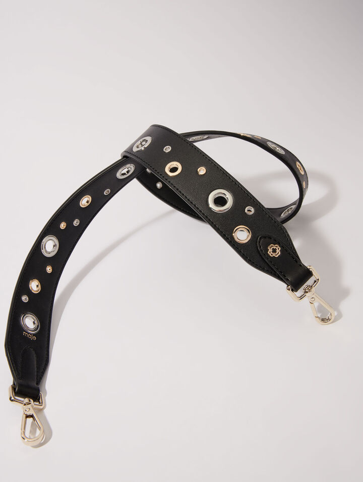 Bandoulière en cuir et œillets