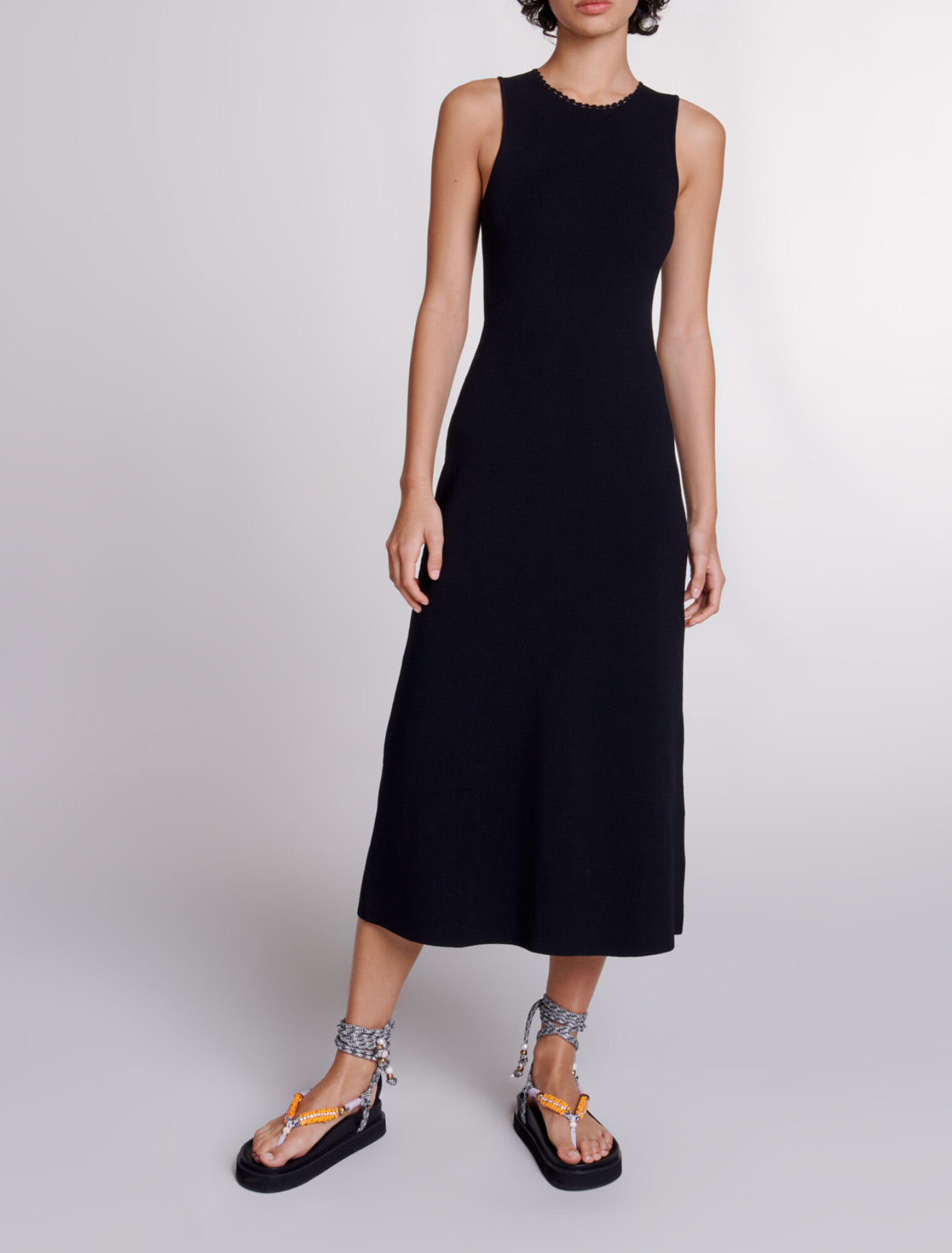 Robe longue en maille à découpes