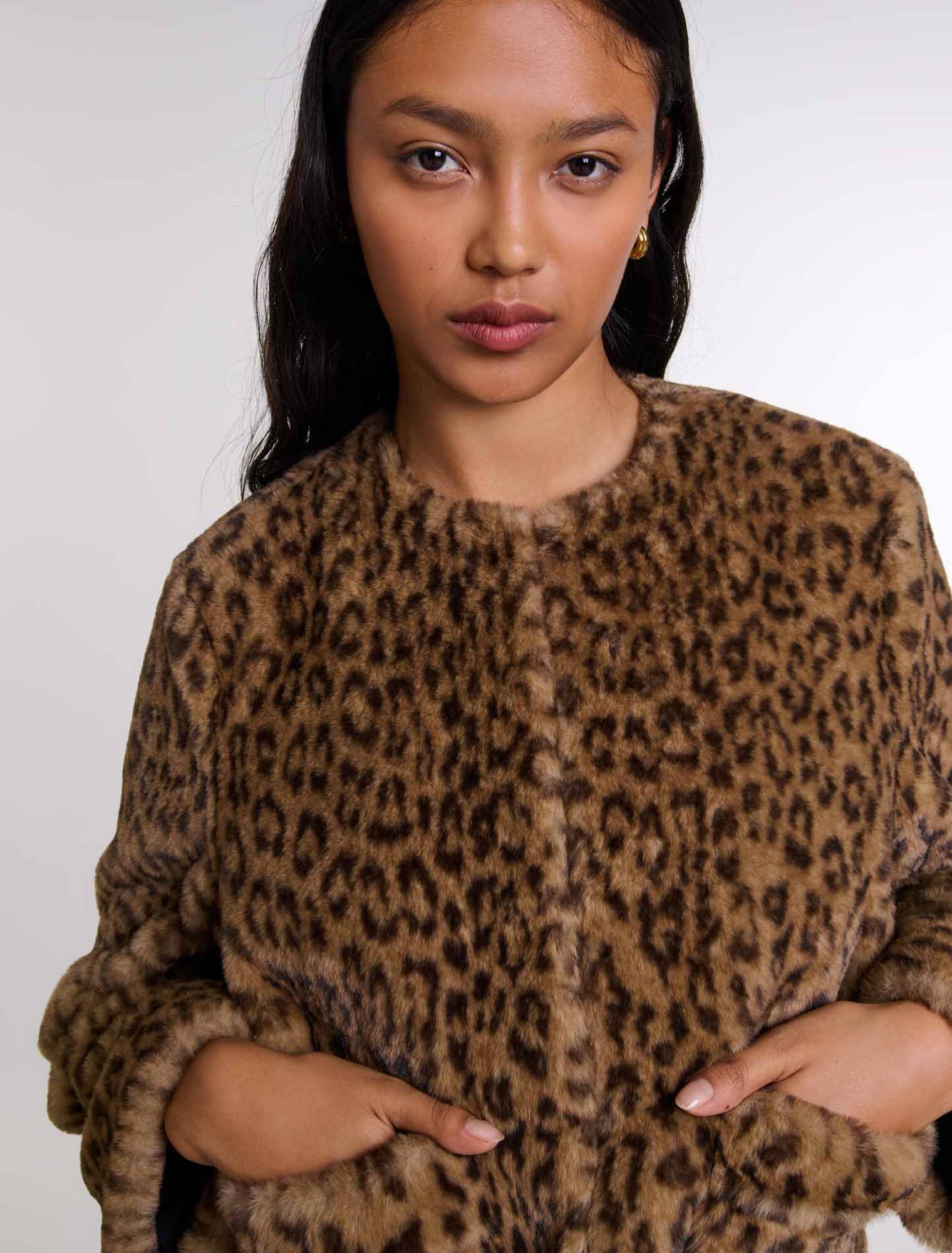 Veste courte en fausse fourrure