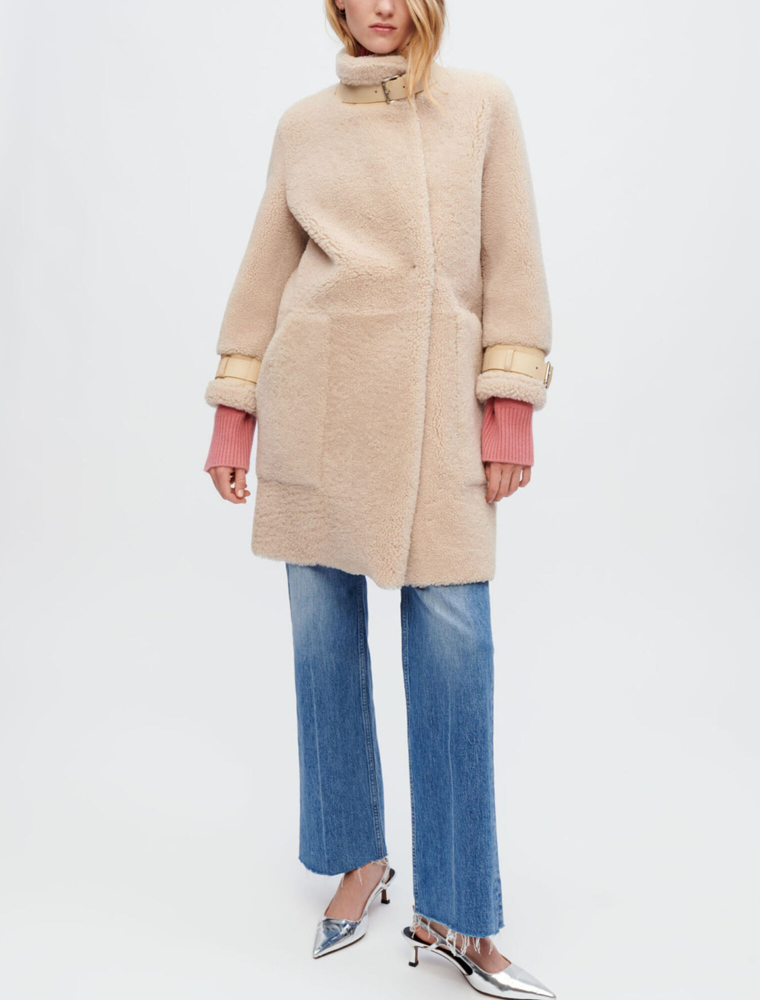 Manteau en peau lainée et cuir