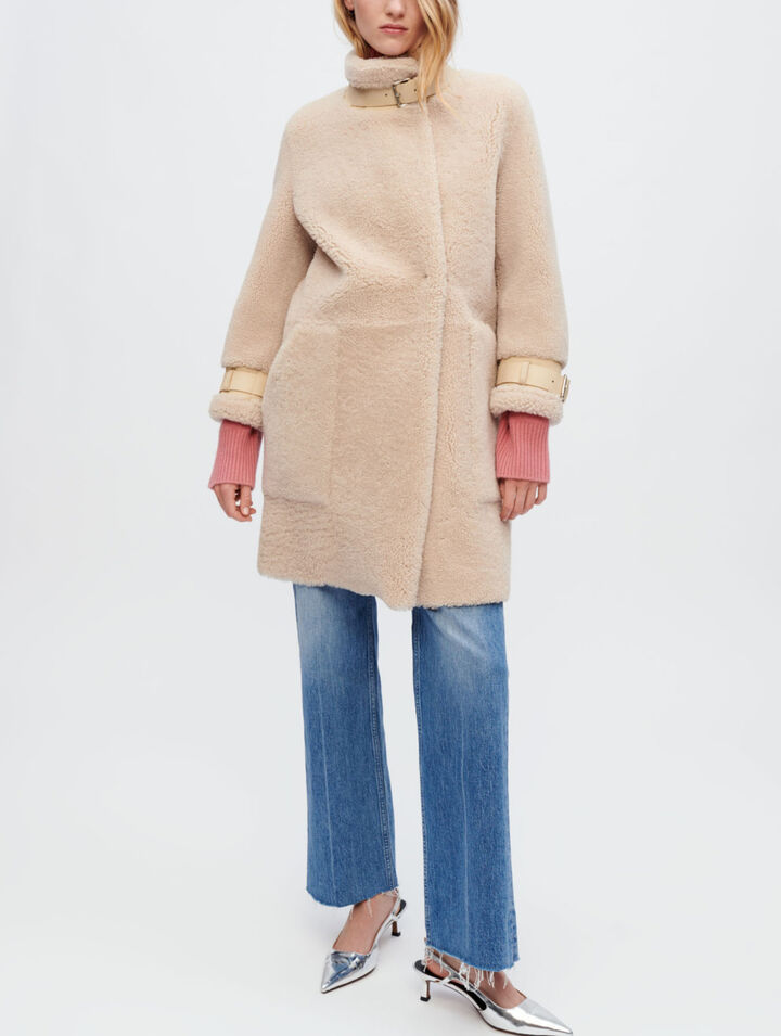 Manteau en peau lainée et cuir